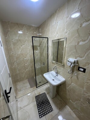 Hair dryer, towels, toilet paper