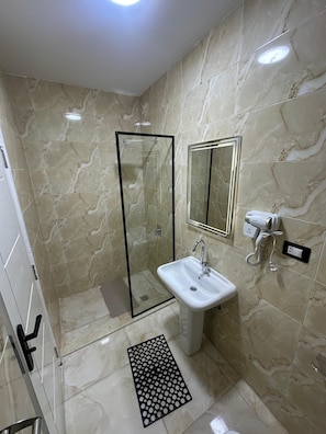 Hair dryer, towels, toilet paper
