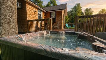 Cottage hot tub in gentle sunset light