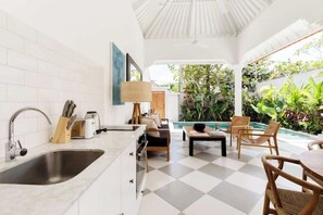 Fridge, stovetop, coffee/tea maker, high chair