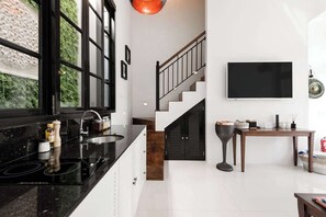 Fridge, microwave, stovetop, coffee/tea maker