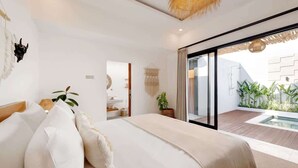 A modern bedroom with a large bed, a glass door leading to a balcony with a pool, and a minimalist decor style.