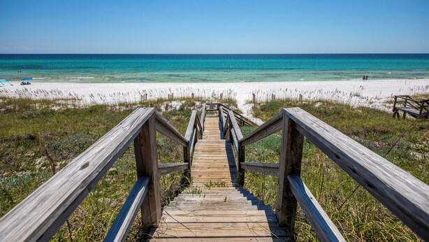 A wooden boardwalk leading to a beach with clear blue water and white sand. - Journeys End 205 - Welcome to your coastal escape! Gulf Front! Private Beach! (Santa Rosa Beach)