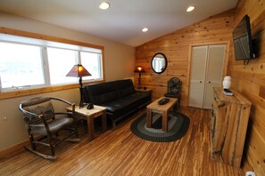 Family Suite, Lake View | Living area | 43-inch TV with cable channels - LakeFront Lodge (Mc Henry)