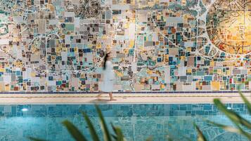 Indoor pool, outdoor pool, open 8:00 AM to 9:00 PM, pool loungers