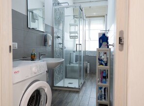 Hair dryer, bidet, towels, soap
