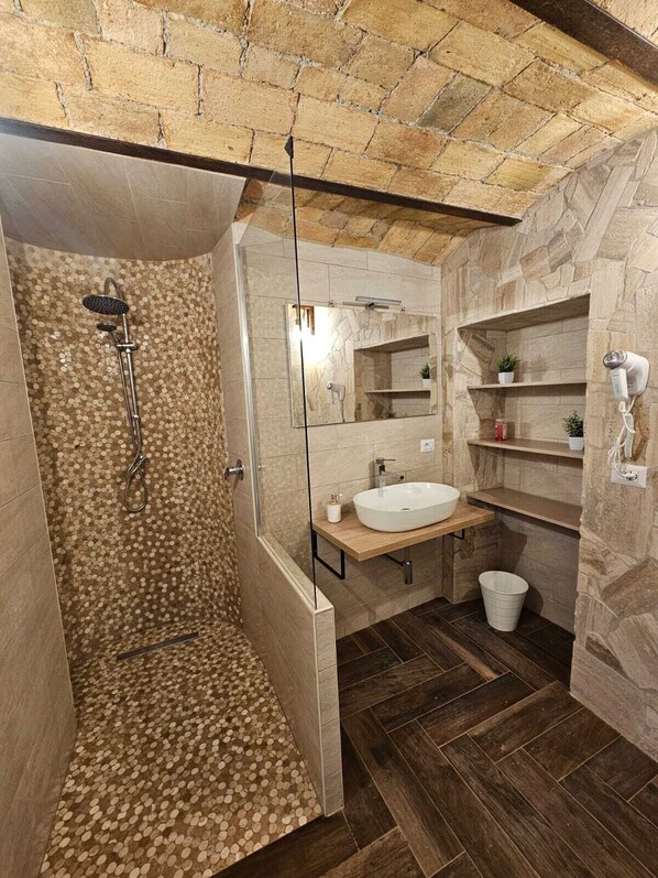 Shower, eco-friendly toiletries, hair dryer, bidet