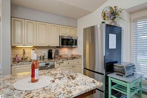 Fridge, microwave, oven, stovetop - Stylish Waterfront Condo @Traverse City-East Bay. The perfect GETAWAY! 1BR/1BA (Williamsburg)