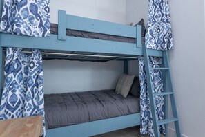 4 bedrooms, desk, iron/ironing board, travel cot