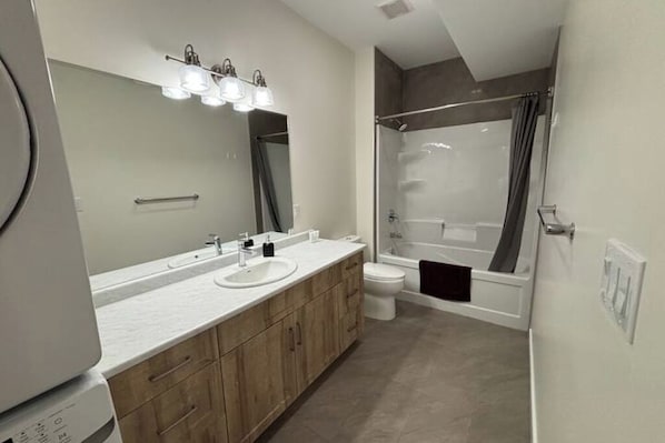 Hair dryer, towels, soap, toilet paper