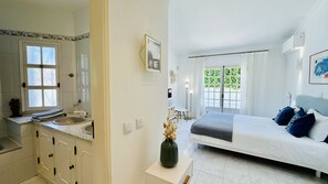 4 عدّة غرف نوم ومكواة/لوح كي وواي فاي مجانًا وملاءات أسرّة