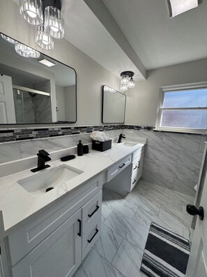 Hair dryer, towels, soap, toilet paper
