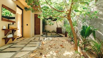 Deluxe Villa, Garden View | Bathroom | Shower, rainfall showerhead, hair dryer, bathrobes