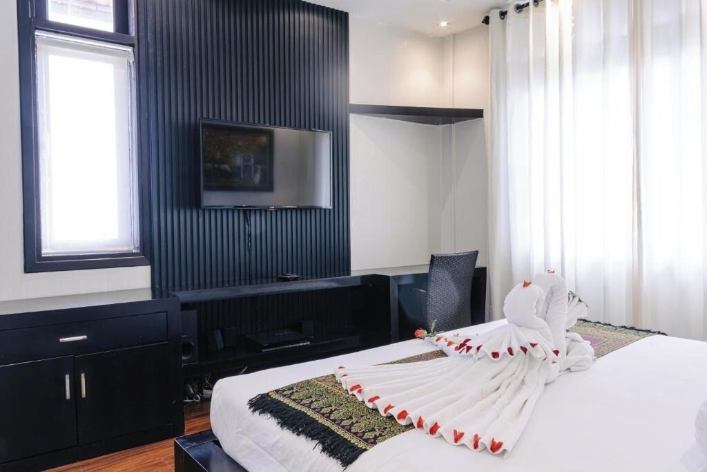 Apartment, 2 Bedrooms | Desk, laptop workspace, blackout drapes, iron/ironing board