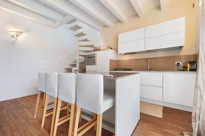 Fridge, microwave, dishwasher, coffee/tea maker