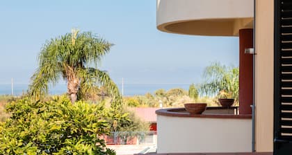 Appartement 'Vacanza Gliaca' avec vue sur la mer, balcon et climatisation