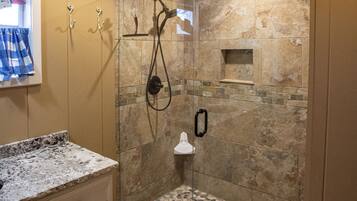 Cabin, 1 Bedroom, Non Smoking, Kitchenette | Bathroom | Shower, hair dryer, towels, shampoo