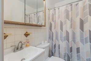 Shower, towels, soap, toilet paper