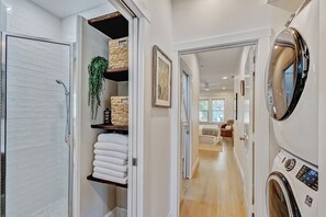 Hair dryer, towels, soap, toilet paper