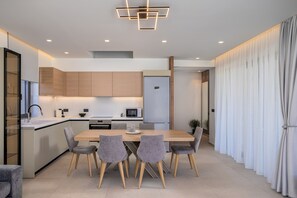 Fridge, microwave, stovetop, dishwasher - Divel Luxury Villas - Villa Ervin with Heated Pool, by Estia (Agkisaras)