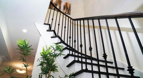 A luxury 4 bedroom and three bathrooms home with two sitting rooms and backyard