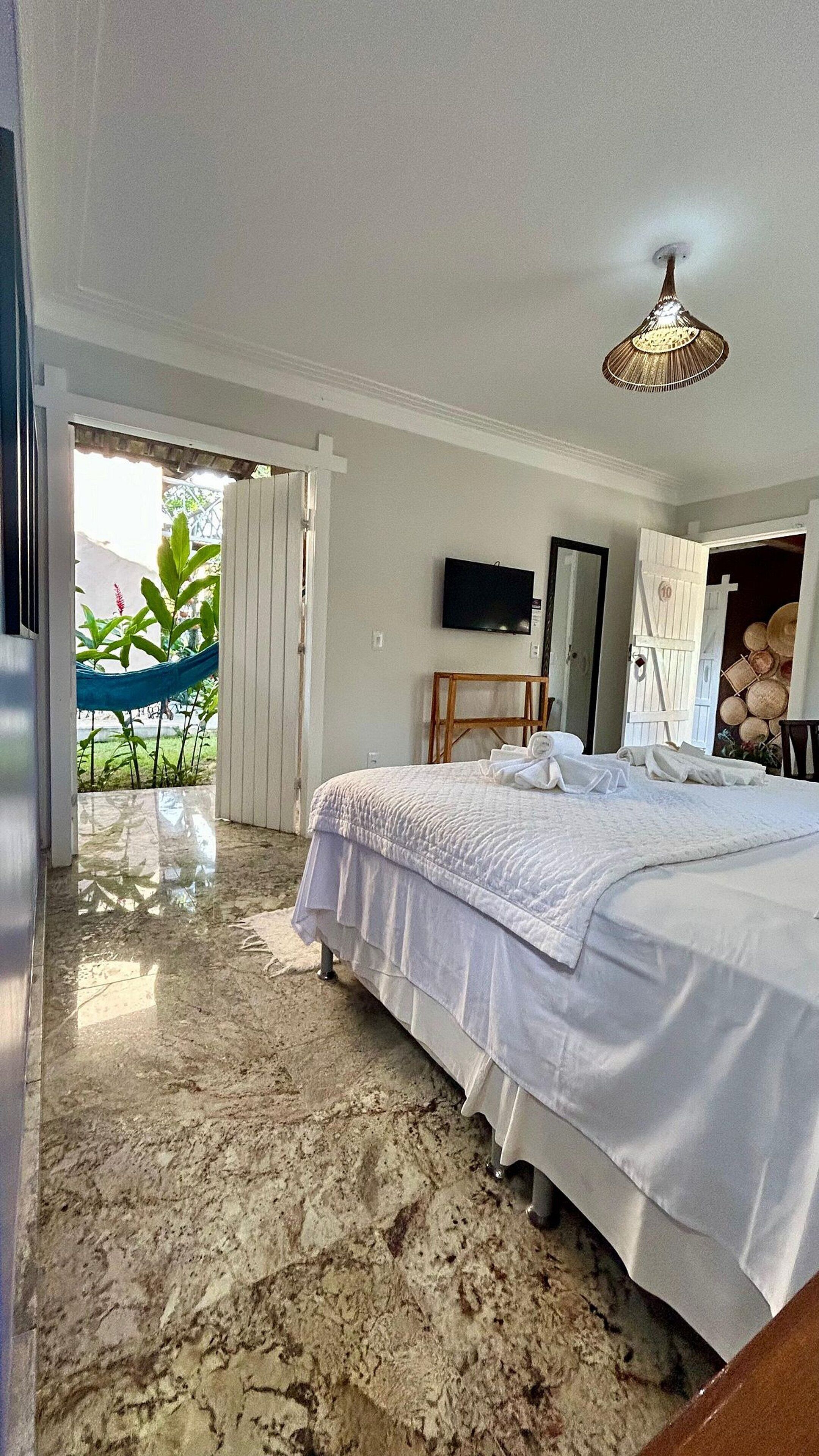 Suíte luxo | Ferros/tábuas de passar roupa, Wi-Fi de cortesia