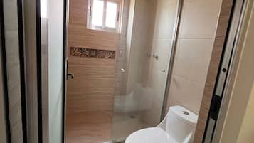 Deluxe Double Room | Bathroom | Shower, towels, soap, shampoo