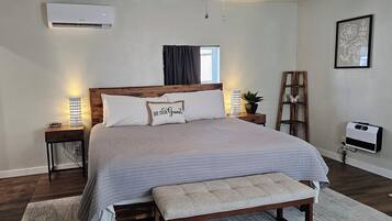 1 bedroom, desk, iron/ironing board, travel cot