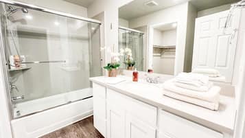 Hair dryer, towels, soap, toilet paper