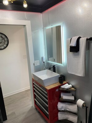 Hair dryer, towels, soap, shampoo