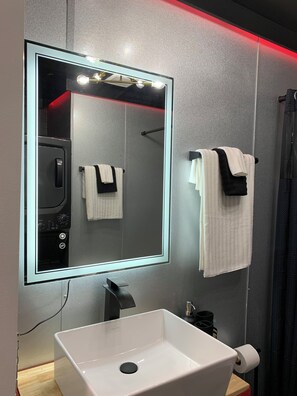 Hair dryer, towels, soap, shampoo