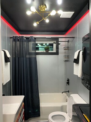 Hair dryer, towels, soap, shampoo