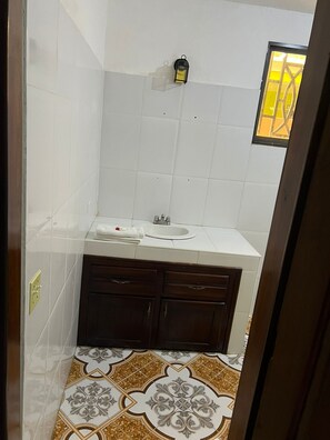 Shower, towels, toilet paper