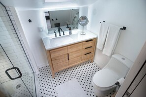 Hair dryer, towels, soap, shampoo