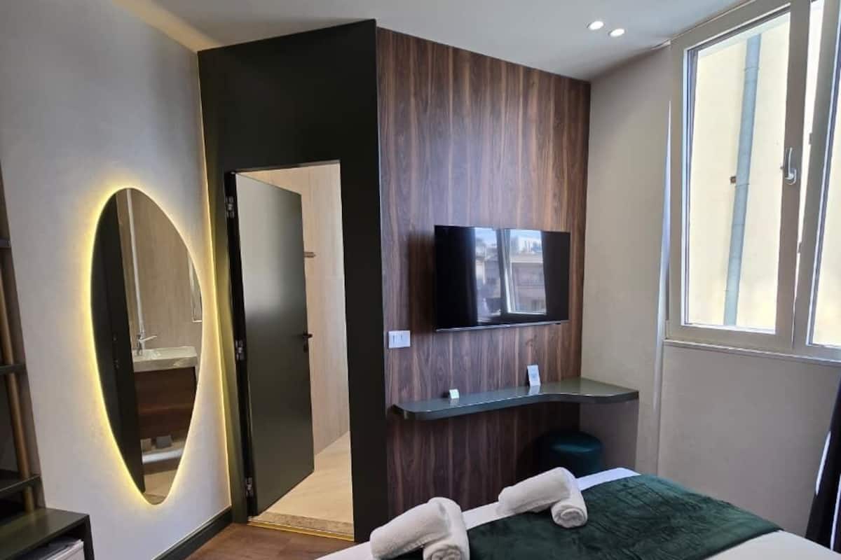 Standard Double Room | Minibar, iron/ironing board, free WiFi, bed sheets