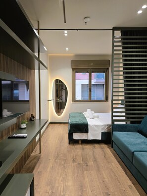 Habitació doble Deluxe | Minibar, planxa i posts de planxar, wifi gratuïta i roba de llit 