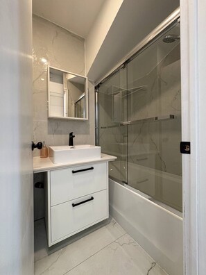 Hair dryer, towels, soap, toilet paper