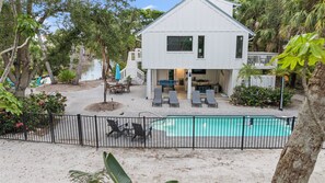 Outdoor pool, a heated pool - Island Sol:  Secluded 4 BR Paradise with Salt Water Pool, Walk to the Village (Siesta Key)