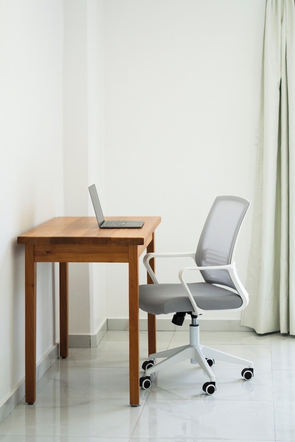 In-room safe, desk, laptop workspace, blackout curtains