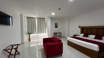 In-room safe, desk, laptop workspace, blackout curtains