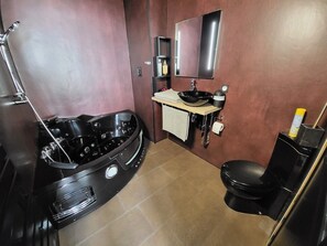 Jetted tub, towels, soap, toilet paper