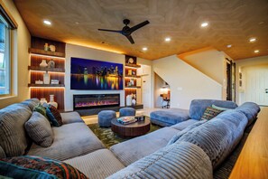 TV, fireplace, books, offices