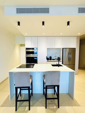 Superior Apartment, Balcony, Ocean View | Private kitchen | Full-size fridge, microwave, oven, stovetop