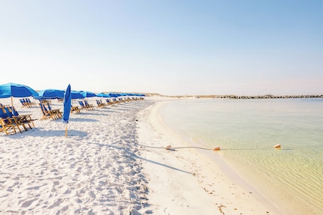 Private beach nearby, white sand, free beach shuttle, beach umbrellas