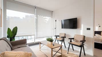Departamento familiar, balcón | Área de sala de estar