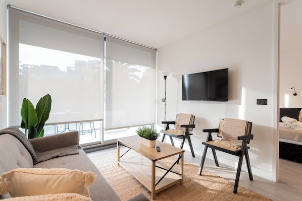 Apartamento familiar, balcón | Zona de estar