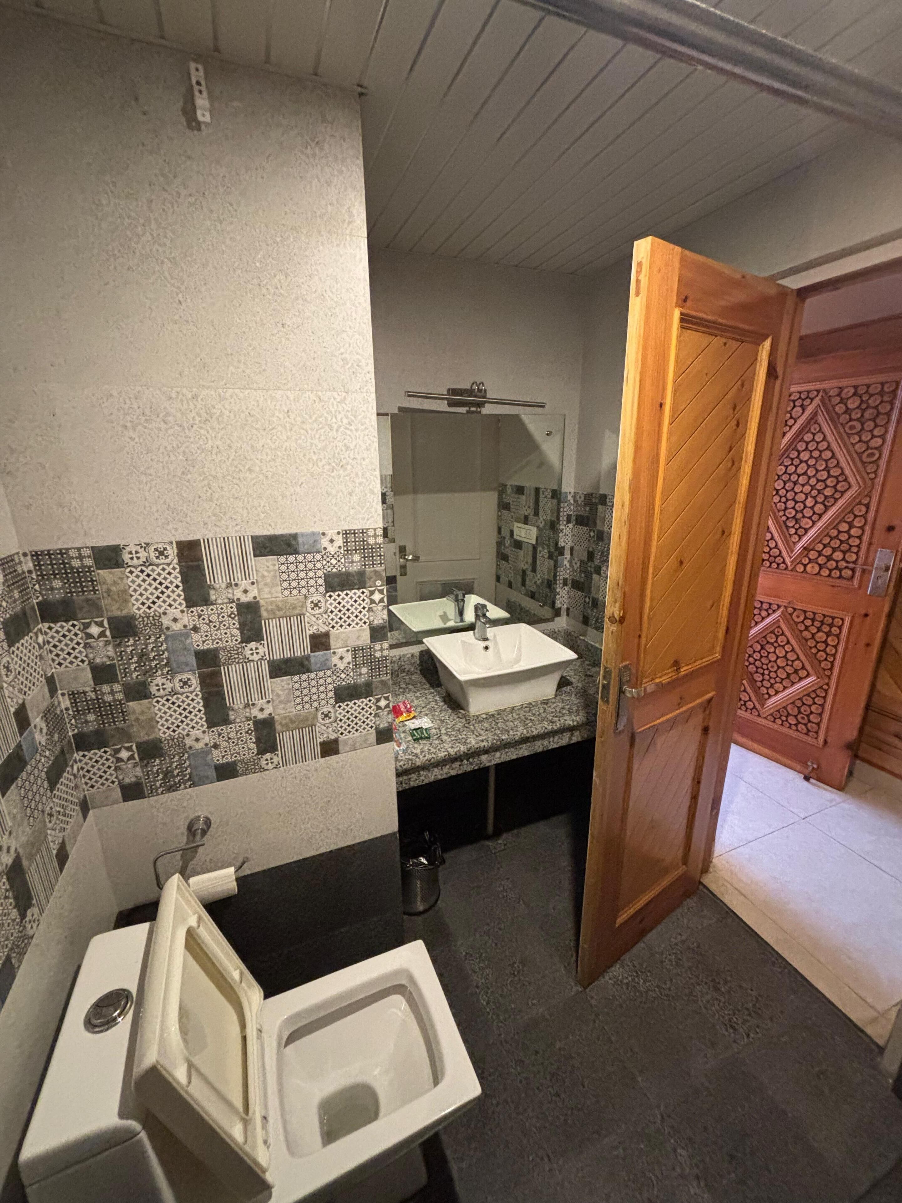 Shower, slippers, towels, soap