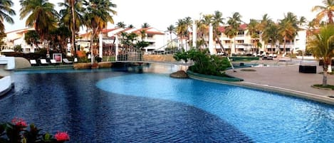 Outdoor pool, open 9:00 AM to 9:00 PM, sun loungers