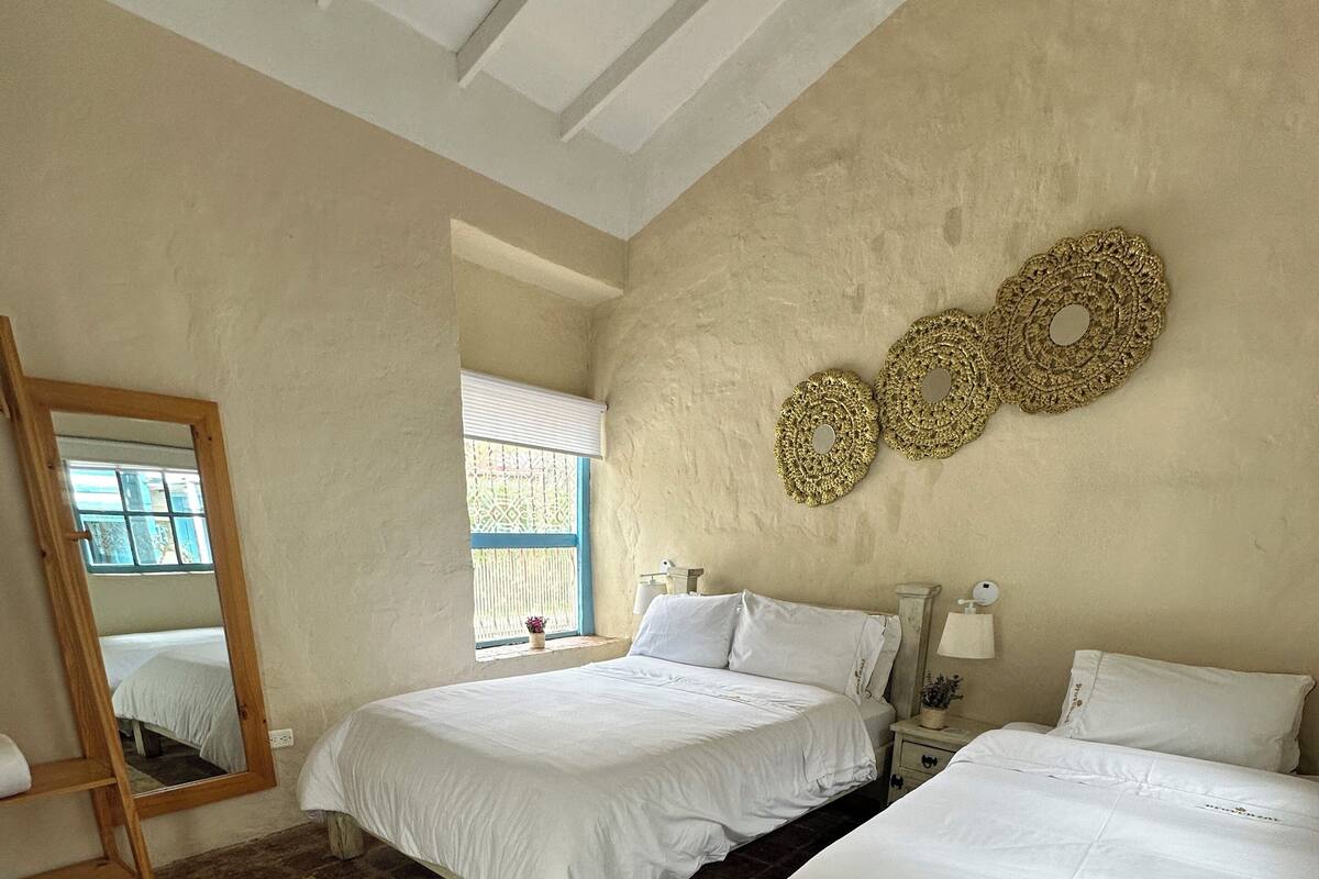 Kolmen hengen standard-huone, näköala puutarhaan | Ilmainen Wi-Fi