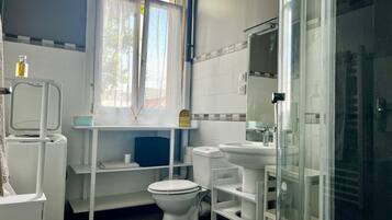 Shower, bidet, towels, soap